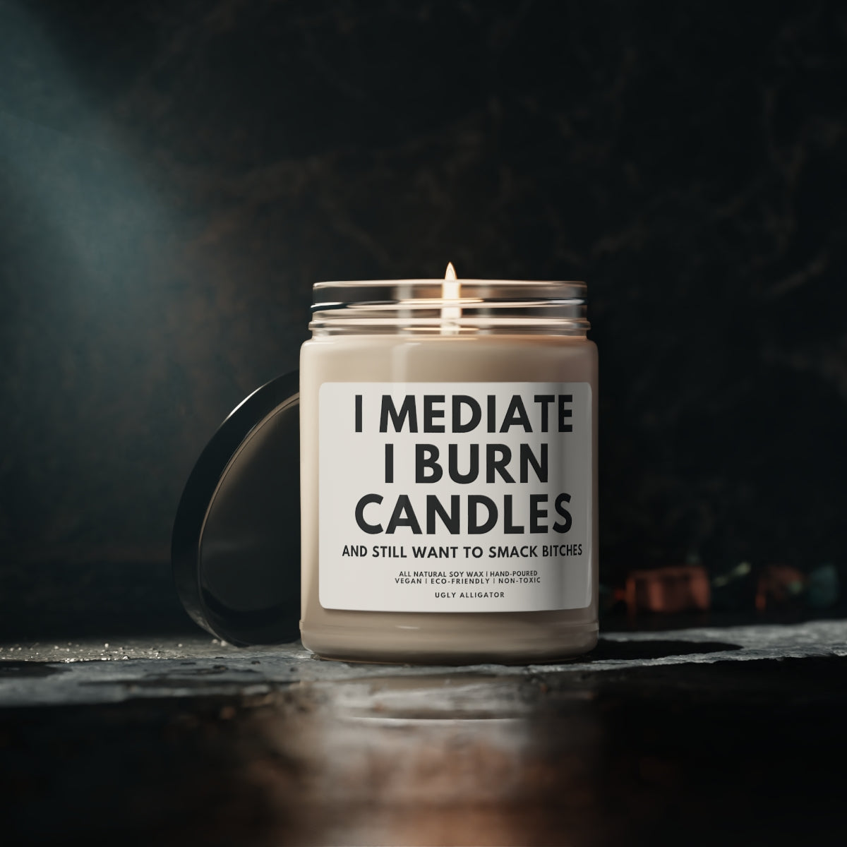 I Meditate, I Burn Candles and Still Smack Bitches Soy Candle in a stylish 9oz glass jar, showcasing its unique label and vibrant wax.